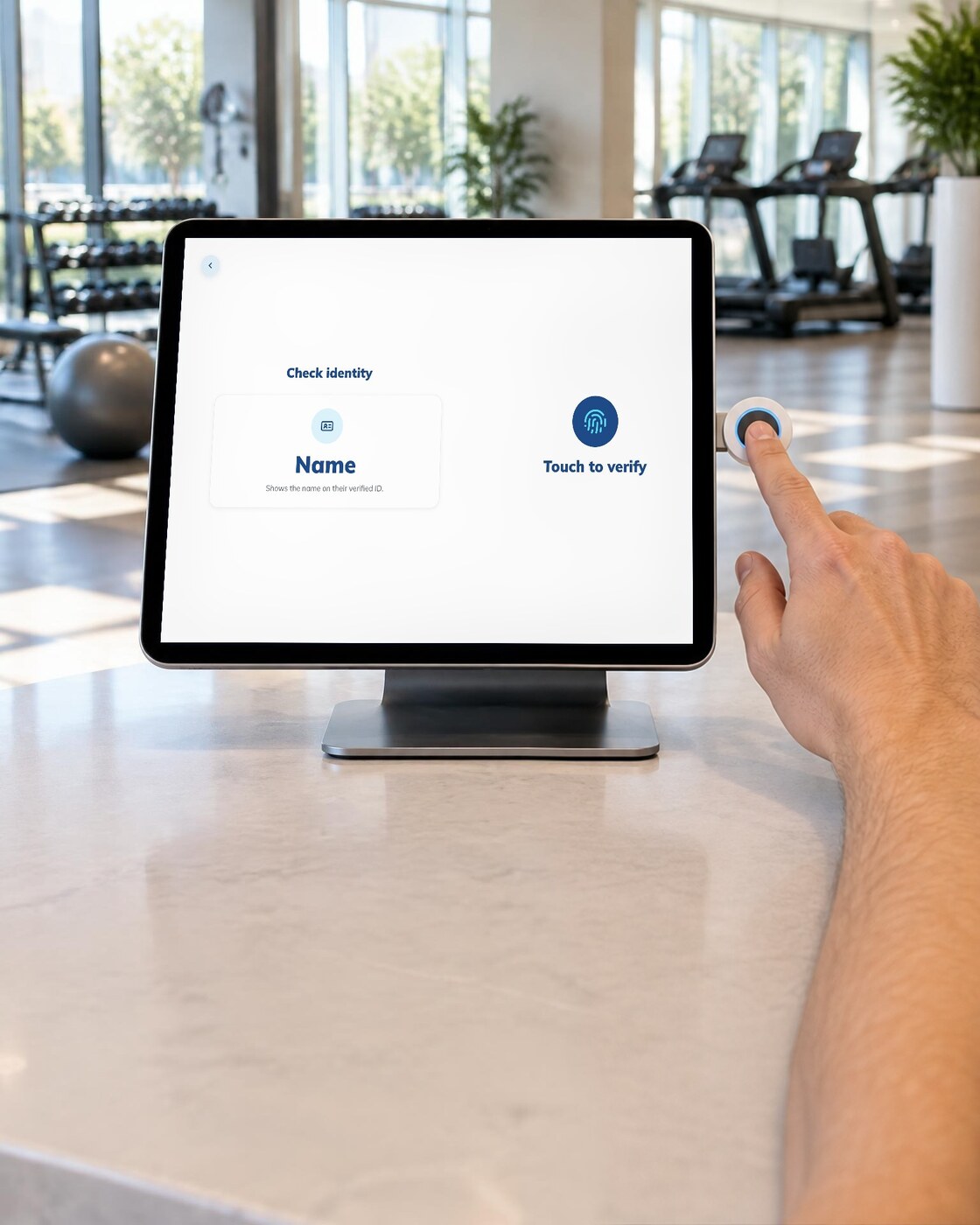 Checking in at a gym front desk with the OVE Sensor